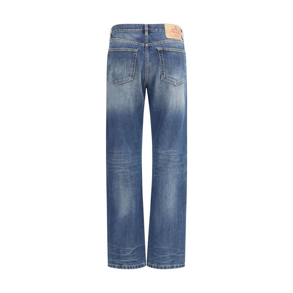 Back view of Prada Blue Cotton Straight-Leg Jeans with five-pocket design, logo patch detail, and regular fit for AW25 collection.