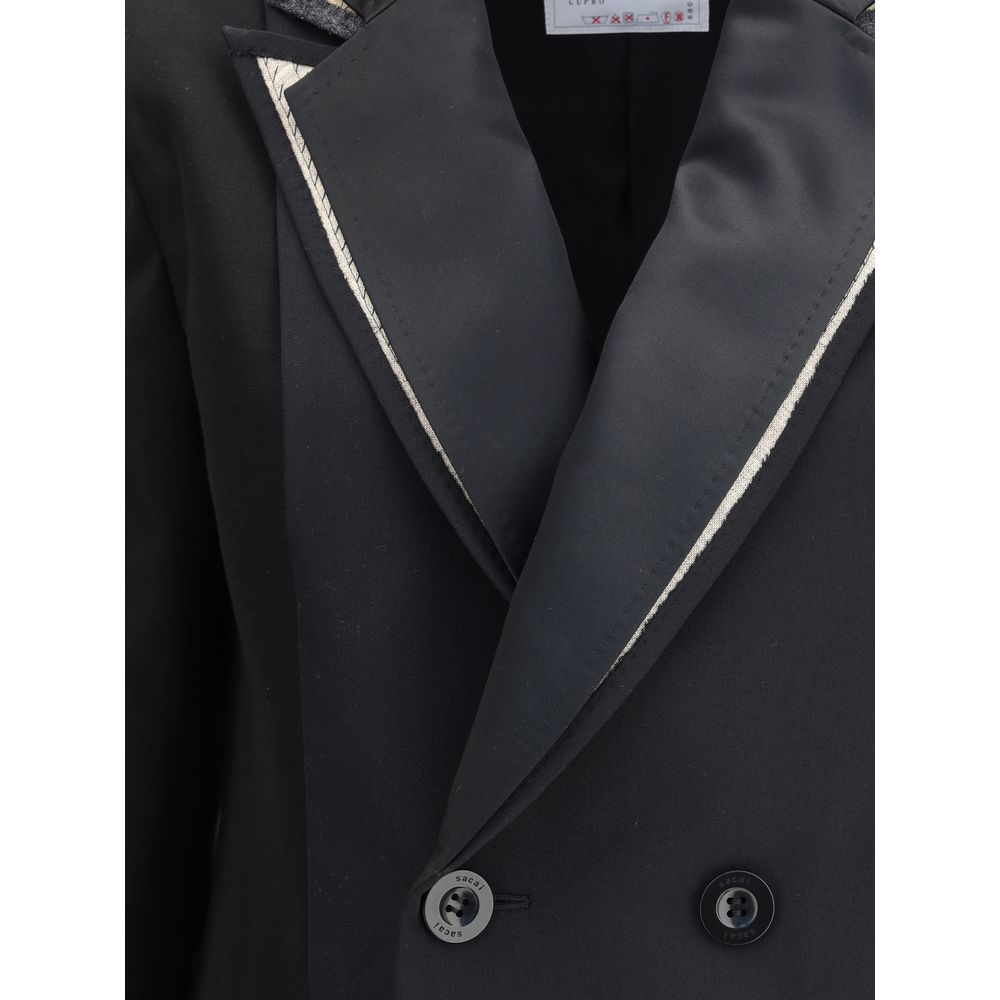Close-up of Sacai Black Polyester Clothing showing double-breasted wool blazer with unique peaked lapels and button details.