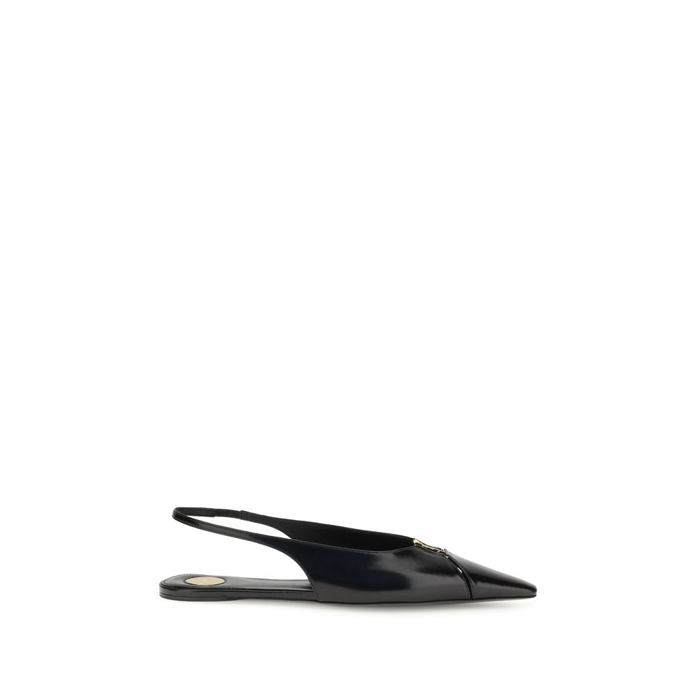 Saint Laurent Black Calf Leather Bos Taurus Ballet Flats with bronze CASSANDRE and elastic strap, side view.
