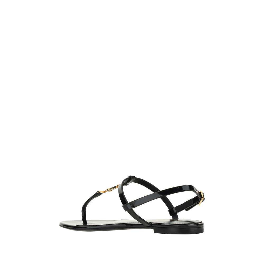 Saint Laurent Black Calf Leather Bos Taurus Flat Sandals with ankle strap and monogram detail, side view, AW25 collection.