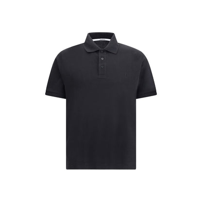 Saint Laurent Black Cotton Polo Shirt with classic collar and embroidered logo, featuring a tone-on-tone three-button front placket.