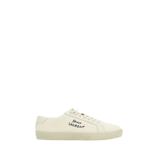 Saint Laurent White Rubber Low Top Sneakers with embroidered branding and crater-effect flat sole on a white background.