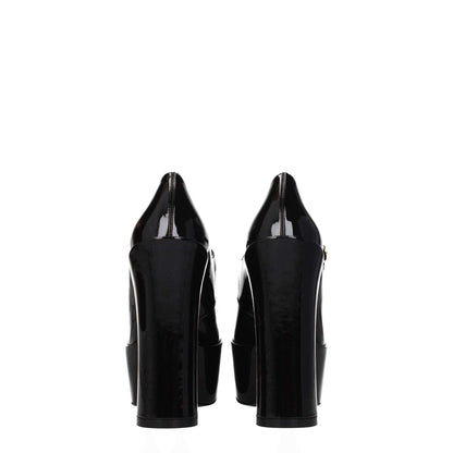 Back view of Stuart Weitzman Black Leather Platform Pumps with high heels and buckle closure.