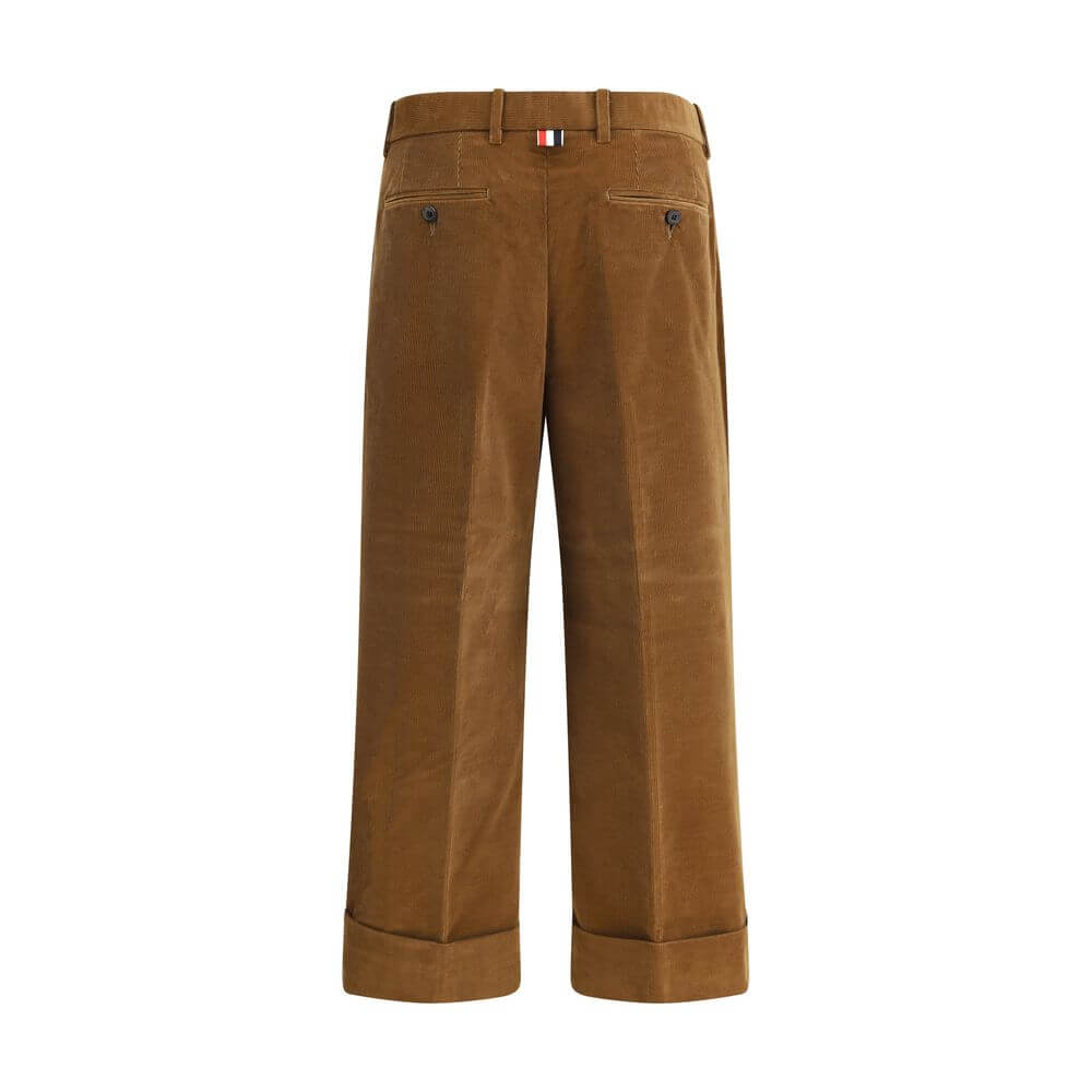 Thom Browne Brown Cotton Casual Pants with tricolor applique and turned-up hems.