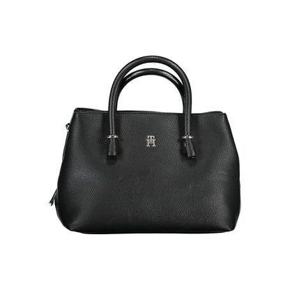 Tommy Hilfiger Black Polyethylene Handbag with adjustable strap, 2 handles, external pockets, logo, zip and snap closure, and contrasting details.