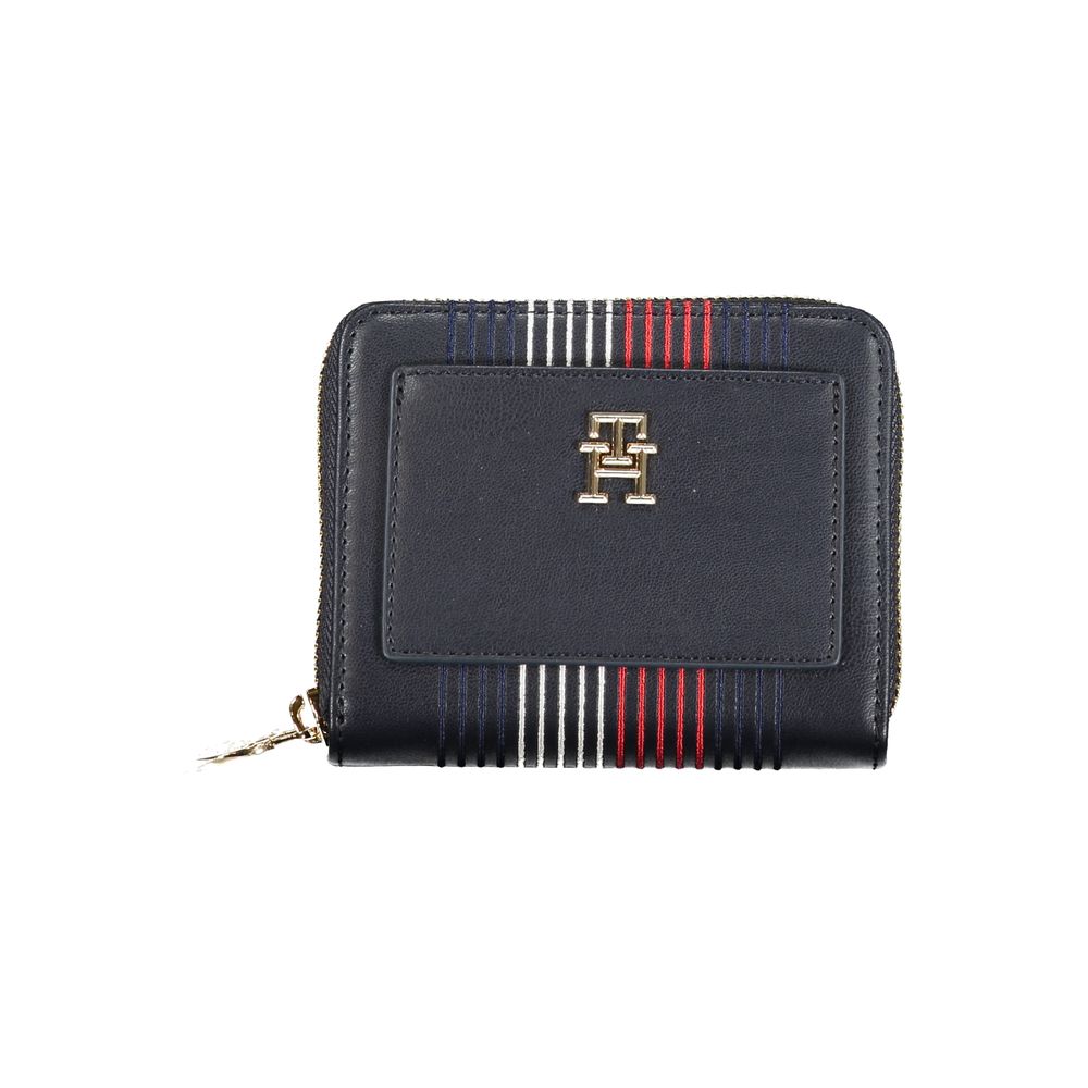 Tommy Hilfiger Blue Polyethylene Wallet with zip closure, external pocket, and logo on front; features contrasting details and card spaces.