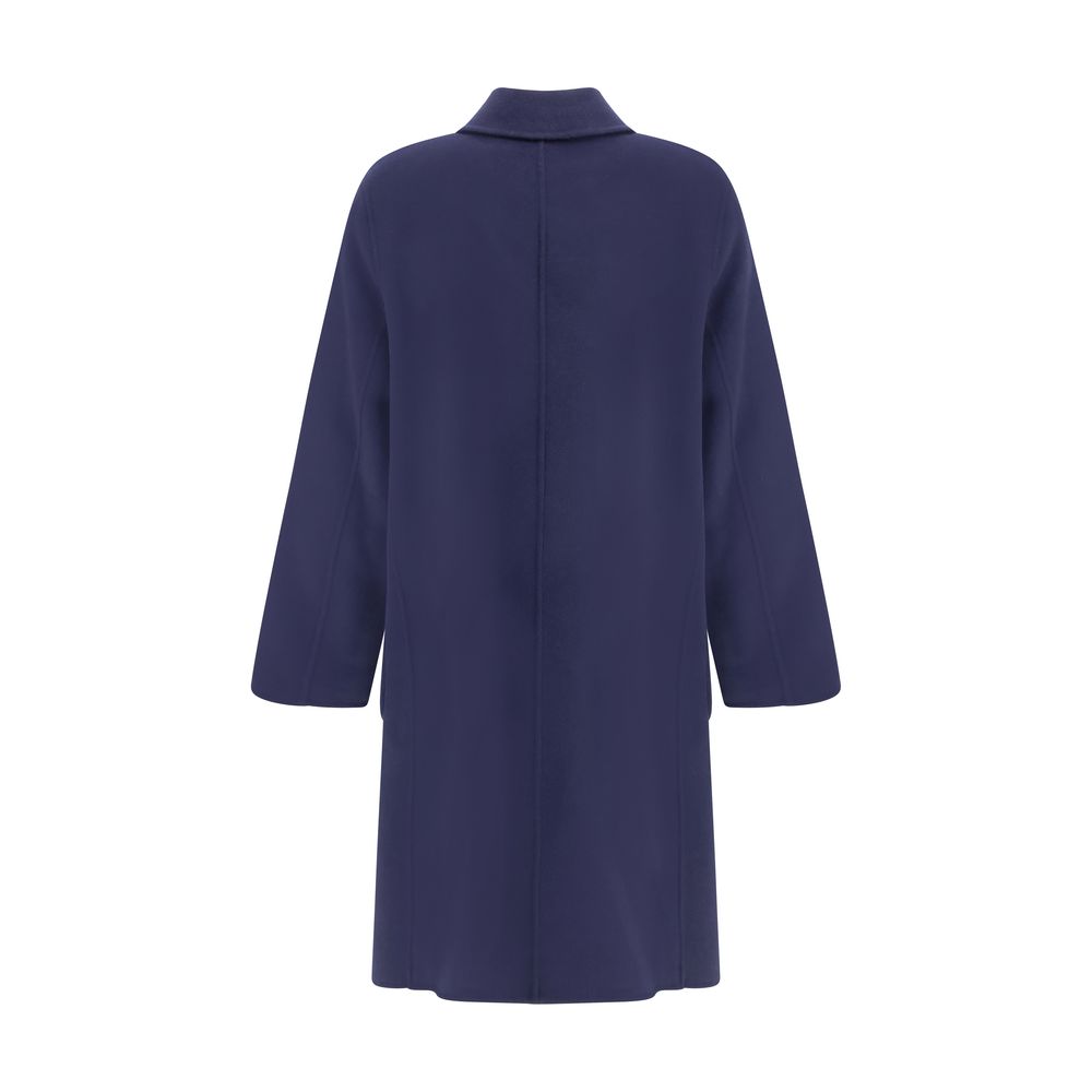 Back view of Tory Burch Blue Wool Coat, featuring reversible design with T Monogram pattern and relaxed fit for AW25 season.