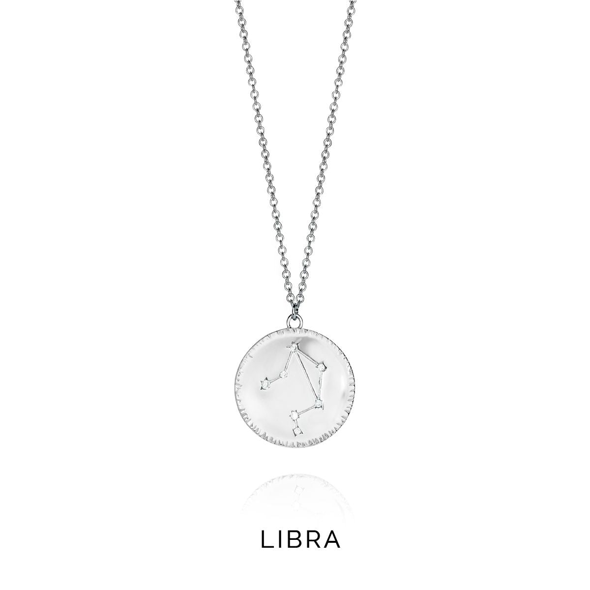Libra constellation necklace with round pendant. Silver design.