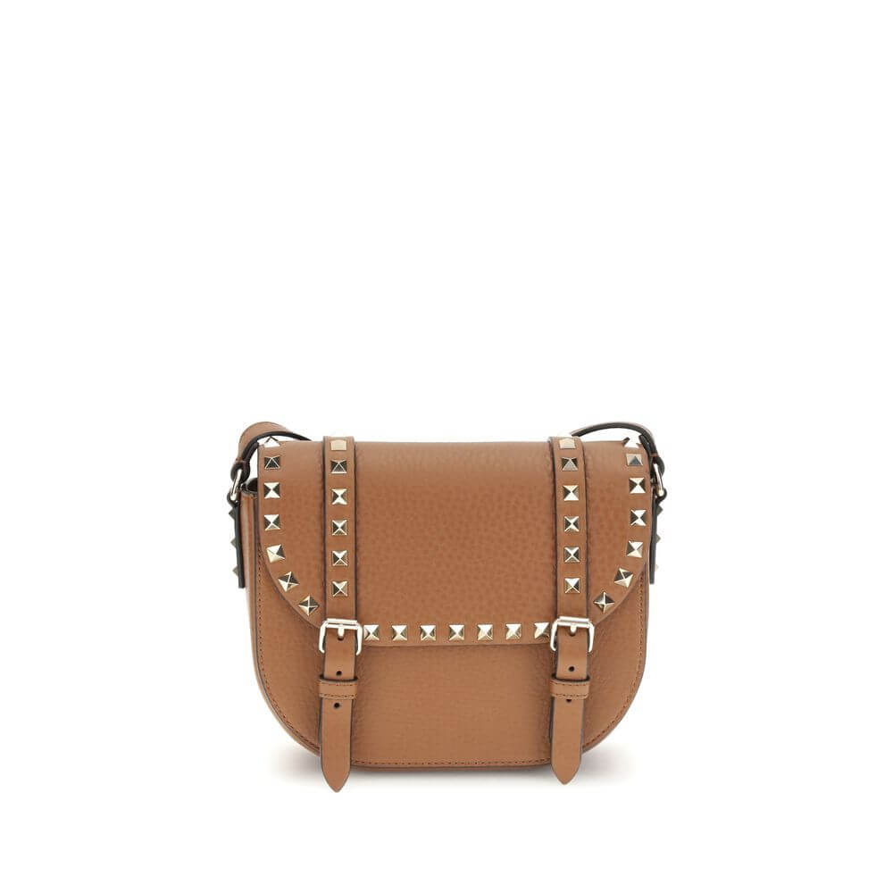 Valentino Garavani Beige Calf Leather Bos Taurus Shoulder Bag with iconic studs, adjustable strap, and front flap closure.