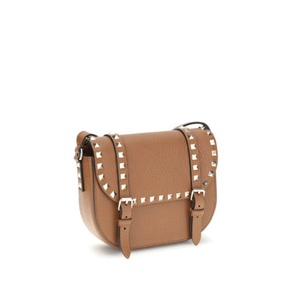 Valentino Garavani Beige Calf Leather Bos Taurus Shoulder Bag with iconic Rockstud embellishments and adjustable strap.
