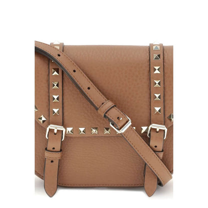 Valentino Garavani Beige Calf Leather Bos Taurus Shoulder Bag with studs and adjustable strap, perfect for AW25 fashion.