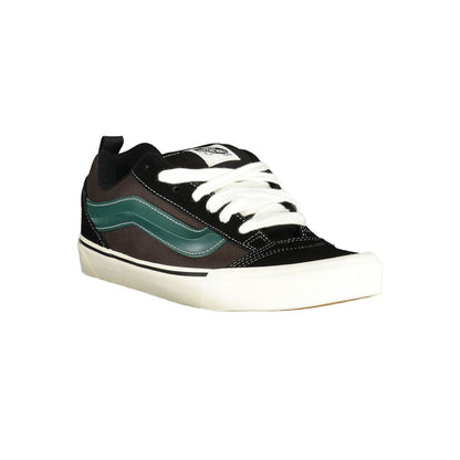 Vans Black Leather Men Sneaker with green accents, showcasing classic design and contemporary flair for street style.