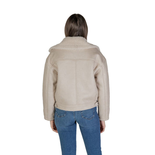 Back view of woman wearing Vila Clothes Beige Artificial Leather Jackets & Coat with shearling-effect collar and asymmetrical zip.