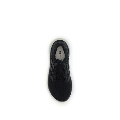 Top view of Y-3 Black Fabric Athletic Sneakers showcasing Yohji Yamamoto’s TPU heel cage and adidas PRIMEKNIT upper.